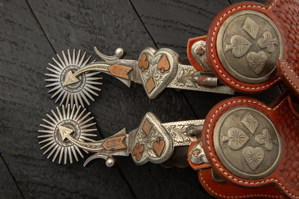 Pair of "Lytle & Mower" marked double mounted, hand engraved Spurs with silver overlay in heart and (1 of 2)