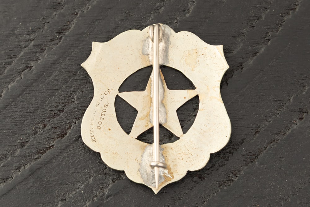 Vintage, shield shaped, cut-out 5-point star Badge marked "ASSTORIA/12/POLICE. Hallmarked on back - 2