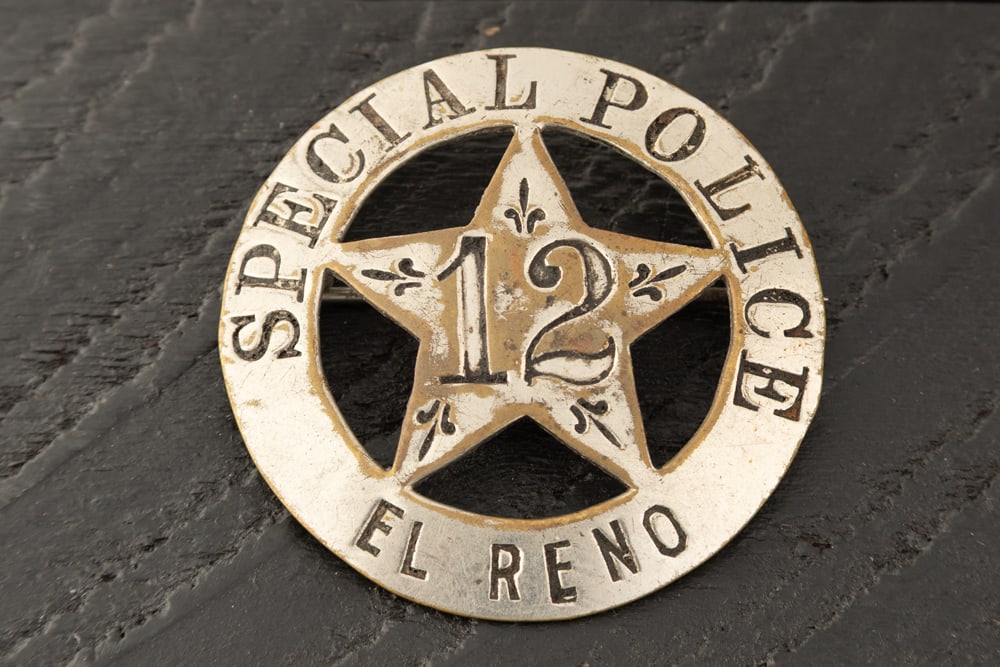 Vintage circle, 5-point cut-out star Badge marked "SPECIAL POLICE/12/EL RENO". Center has lots of (1 of 2)