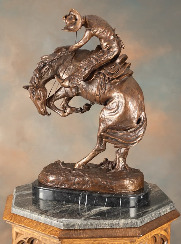 Large Western Bronze known as "Rattlesnake", marked on base "Copyright Frederick Remington". Bronze (1 of 3)