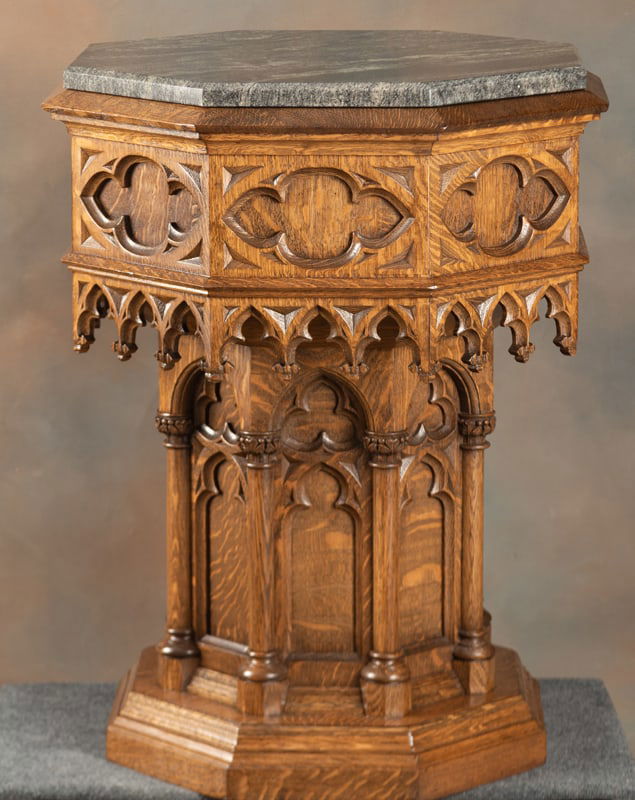 A massive antique oak Pedestal, circa 1900, with octagon shaped granite top. Pedestal has octagon (1 of 4)