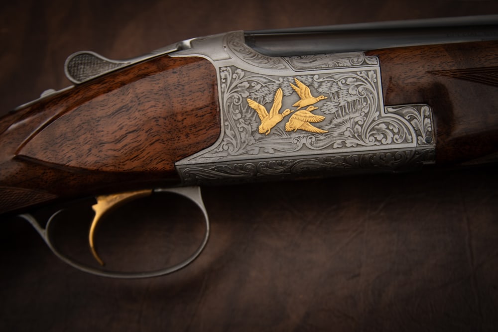 Belgium Browning O/U Presentation Grade P2P, 20 ga., Shotgun, mfg. 1979, SN P33RN1140, gold inlaid: Belgium Browning O/U Presentation Grade P2P, 20 ga., Shotgun, mfg. 1979, SN P33RN1140, gold inlaid with mallards, pheasants and quail, 38" barrels, full/mod, 14 1/4" length of pull, long tang flat kno