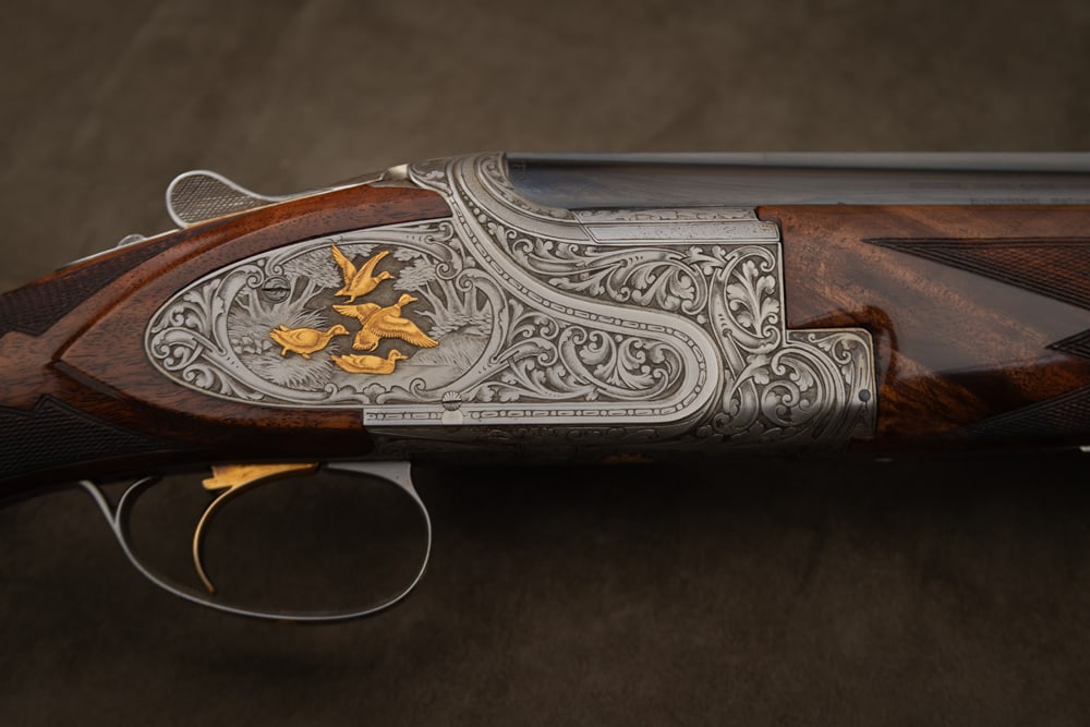 Belgium Browning Presentation P4 Grade Superposed O/U, 12 ga., Shotgun, SN P54RR1117, with factory: Belgium Browning Presentation P4 Grade Superposed O/U, 12 ga., Shotgun, SN P54RR1117, with factory barrels, first barrel 30" marked full/full, second barrel 26 1/2" marked full/full. Hand engraved ful