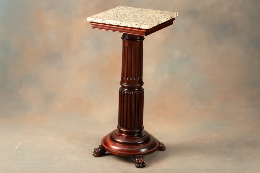 Beautiful antique, solid mahogany Pedestal, circa 1910-1915, on round claw foot base. Pedestal: Beautiful antique, solid mahogany Pedestal, circa 1910-1915, on round claw foot base. Pedestal measures 33" T and has large reeded column supporting 15" square marble top. Excellent finish and conditi