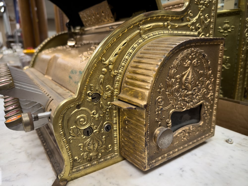 Antique Brass National Cash Register, Model 47-2-2, last patent date 1896, SN 302080. Unique model: Antique Brass National Cash Register, Model 47-2-2, last patent date 1896, SN 302080. Unique model with three side marble coin shelf. Register is in working order, has slight hairline crack in marble