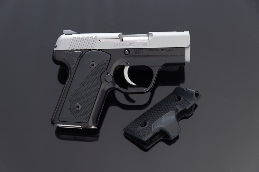 Kimber, Solo Carry, Semi-Auto Pistol, 9MM caliber, SN S1106577, brushed stainless slide and blue: Kimber, Solo Carry, Semi-Auto Pistol, 9MM caliber, SN S1106577, brushed stainless slide and blue finish, near pristine condition. Sold in original serial numbered shipping box with manual, paperwork,