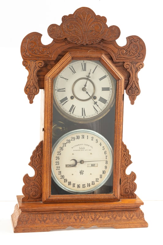 Antique oak case Waterbury, double dial Calendar Parlor Clock, patented late 1800's. Clock measures (1 of 5)