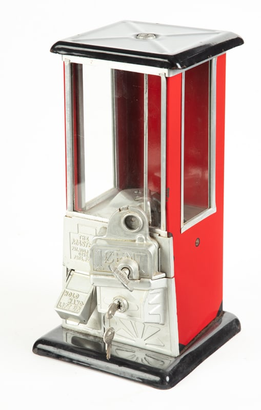 Vintage cast iron red and black porcelain 1 cent coin-op Gumball Machine titled "The Master", (1 of 3)