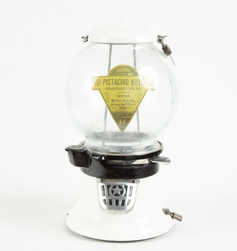 Vintage cast iron, black & white porcelain,1 cent coin-op Gumball Machine marked "Pistachio Nuts", (1 of 3)