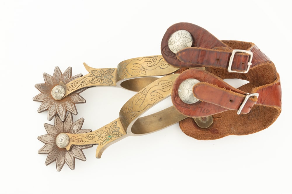 Pair of Jack Ferguson, "J.F." marked, double etched bronze Spurs with engraved silver fixed buttons, (1 of 2)