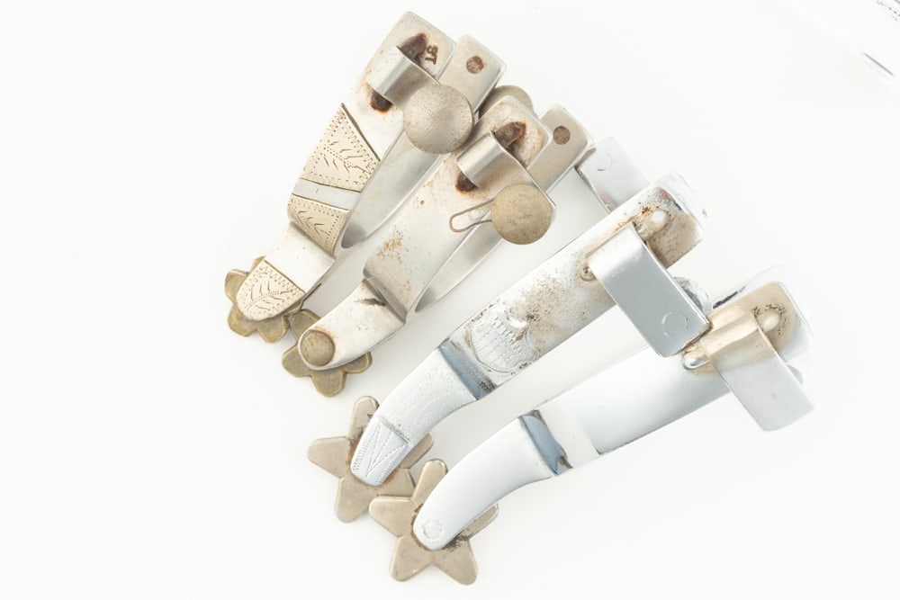 This lot consists of two pairs of Spurs to include: (1) Pair of single mounted "Crockett" marked (1 of 1)