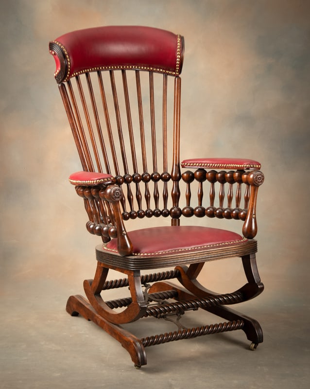 Antique Hunzinger Platform Rocker in one of the most desirable styles ever, The Lollipop, completely: Antique Hunzinger Platform Rocker in one of the most desirable styles ever, The Lollipop, completely restored to an excellent finish and professionally upholstered in red leather, circa mid 1870-1900.