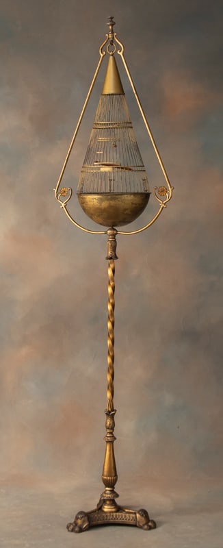 Unusual antique cast iron and brass Bird Cage, circa 1915-1920, marked "Hendryx" with unusual cone: Unusual antique cast iron and brass Bird Cage, circa 1915-1920, marked "Hendryx" with unusual cone shaped cage, first of its kind to surface in years, original finish and patina, 77" T with 26" L cage