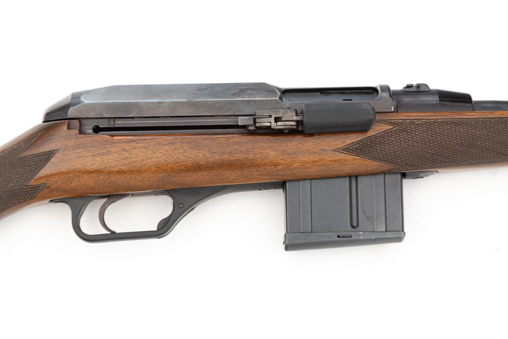 Heckler & Koch, Model 940, S/A Rifle, .30/06 caliber, SN 00857. Rifle has a 21" barrel with factory: Heckler & Koch, Model 940, S/A Rifle, .30/06 caliber, SN 00857. Rifle has a 21" barrel with factory muzzle brake, 10 round magazine, shows minor handling marks on wood, excellent finish on metal (MODE