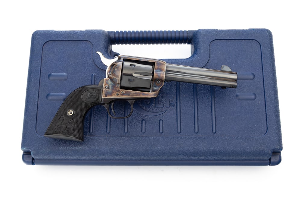 Colt, SAA Revolver, .44/40 caliber, SN 82714SA, blue finish with case hardened frame, 4 3/4" barrel: Colt, SAA Revolver, .44/40 caliber, SN 82714SA, blue finish with case hardened frame, 4 3/4" barrel in pristine original finish. Sold in original blue plastic carry box. (MODERN)