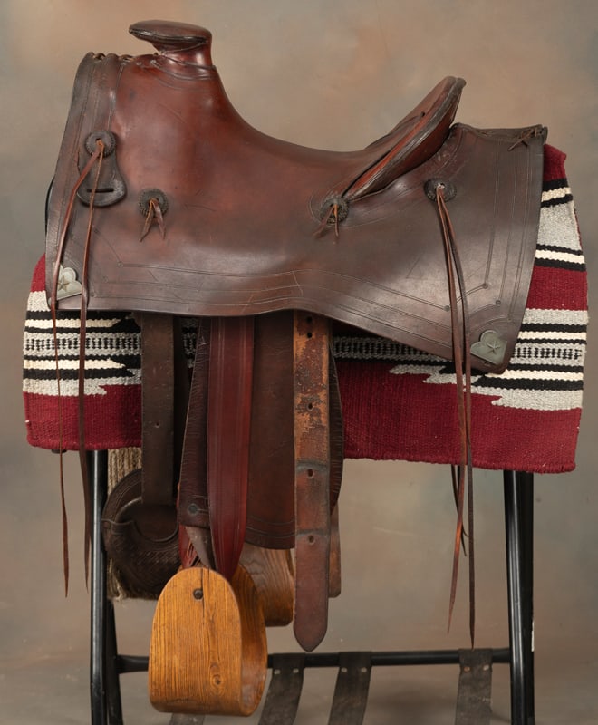 Mother Hubbard style vintage Saddle, 12" seat, 2 1/2" cantle, early square skirt with raised pewter (1 of 2)