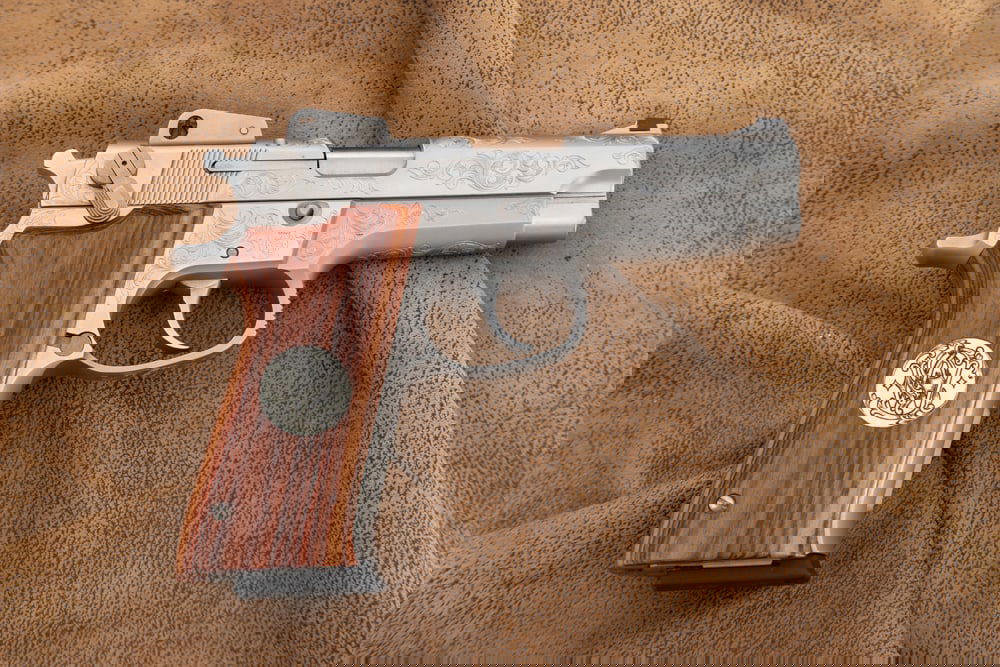 Smith & Wesson, Model 5906, 9 MM S/A Pistol, SN TZW0702, new in fitted wooden case. Factory engraved (1 of 4)