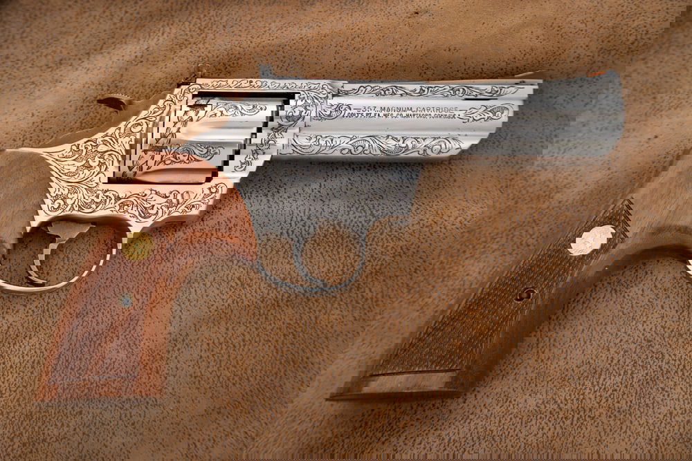 Engraved Colt King Cobra, SN EK3539. This is a .357 Magnum caliber, 6-shot Revolver with a 4: Engraved Colt King Cobra, SN EK3539. This is a .357 Magnum caliber, 6-shot Revolver with a 4” barrel, manufactured in 2007. The gun is custom engraved in tastefully executed scrolls on a polishe
