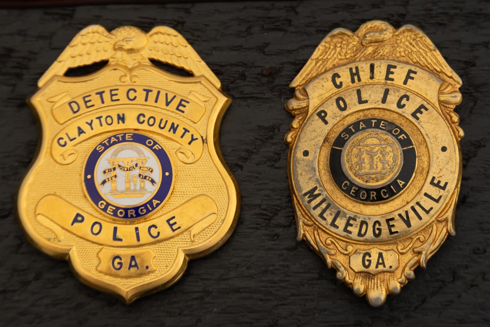 This lot consists of two Badges to include: (1) Beautiful vintage gold tone Shield Badge with Eagle (1 of 2)