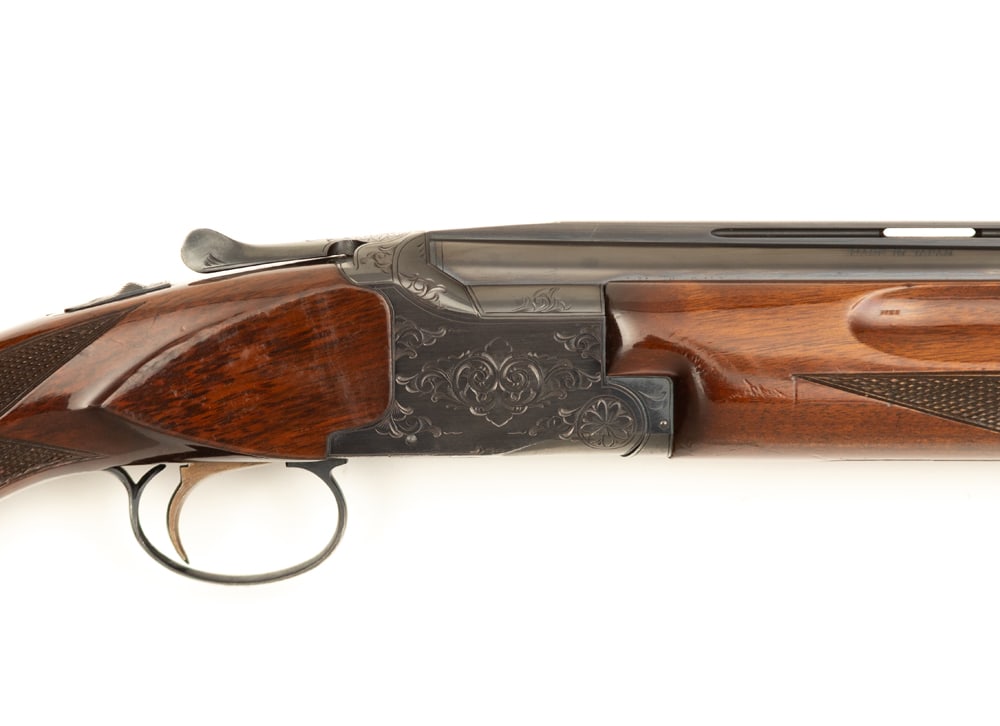 Winchester, Model 101, OU Shotgun, 20 gauge, SN K245557, blue finish with engraved receiver, 26": Winchester, Model 101, OU Shotgun, 20 gauge, SN K245557, blue finish with engraved receiver, 26" ribbed barrel, high gloss finish with checkered stock and forend, 14" trigger pull, light handling mark