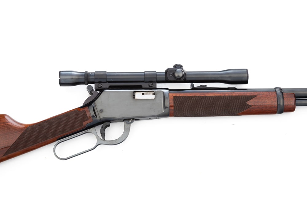 Winchester, Model 9422MXTR, L/A Rifle, .22 WMR caliber, SN F545587 with 20" barrel, clean bright: Winchester, Model 9422MXTR, L/A Rifle, .22 WMR caliber, SN F545587 with 20" barrel, clean bright bore, possibly unfired. Fitted with a Weaver 22 Tip Off Scope, minor handling marks on stock, otherwise