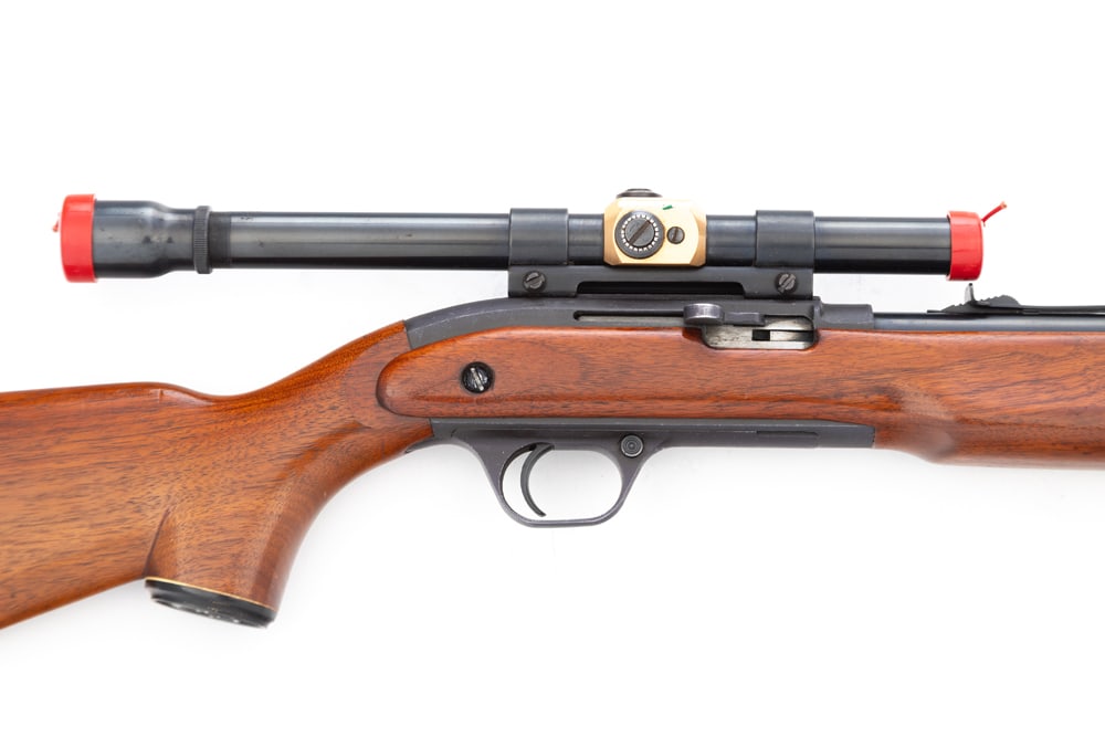 J.C. Higgins, Model 31, S/A Rifle, .22 S.L.L.R. caliber, SN 2552429, with 24" barrel, topped with a: J.C. Higgins, Model 31, S/A Rifle, .22 S.L.L.R. caliber, SN 2552429, with 24" barrel, topped with a J.C. Higgins Scope, tubular magazine . NOTE: Stock has very unique retractable sling. (MODERN)