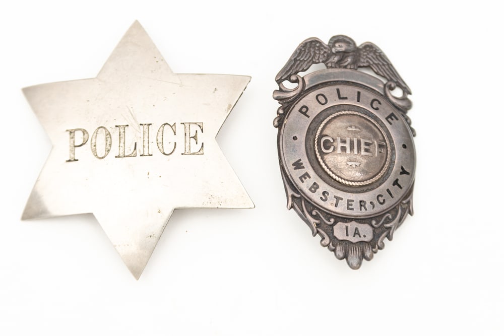 This lot consists of Two (2) Badges to include: (1) Large stock 6-point Star Badge marked (1 of 2)
