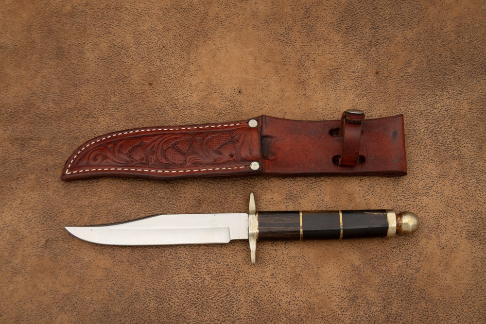 Handmade Clip Point Bowie Knife in leather sheath, appears to have a horn handle with 6" blade, 11 (1 of 2)