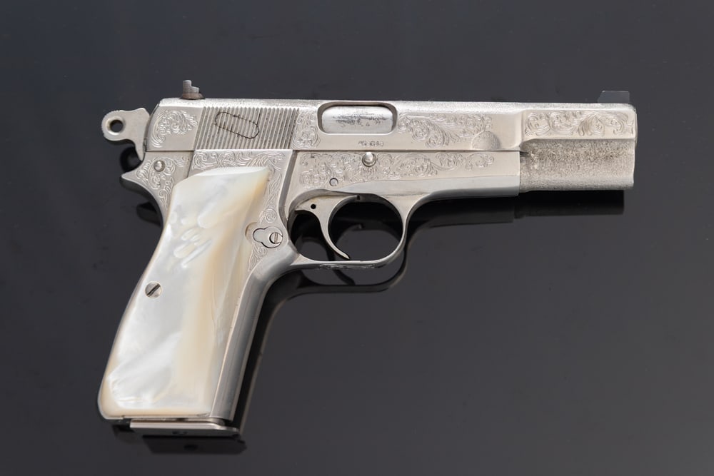 Fabrique Nationale, HP, Semi-Auto Pistol, 9 MM caliber, SN 58640, engraved nickel finish, 4 1/2" (1 of 2)