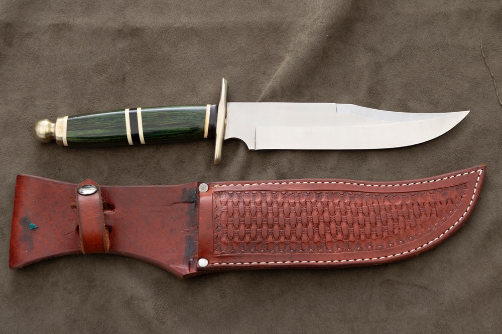 Large Clip Point Bowie Knife, no maker mark visible, 8" blade, 14" overall, possibly horn handle (1 of 2)