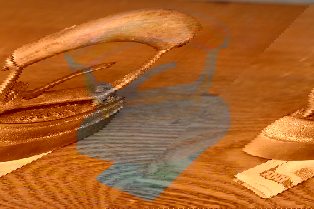 Unique antique miniature cast iron Salesman Sample Smoothing Iron with wooden handle and spring (1 of 3)