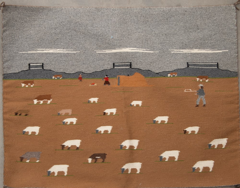Unique Navajo Pictorial Weaving showing people, sheep, and cattle. Rug measures 34 1/2" x 27".: Unique Navajo Pictorial Weaving showing people, sheep, and cattle. Rug measures 34 1/2" x 27". Excellent condition.