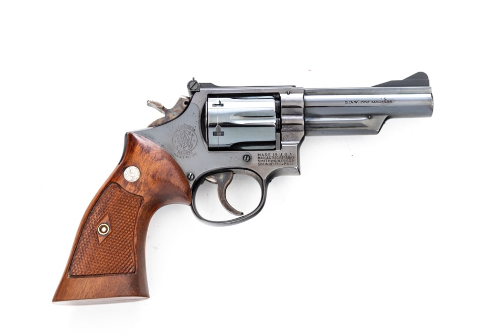 Smith & Wesson, Pre-Model 19, DA Revolver, .357 Mag caliber, SN 27244, four screw , excellent (1 of 2)