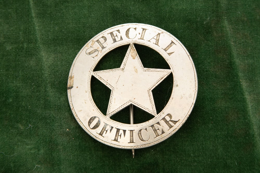 Vintage 5-point Circle Star Badge marked “SPECIAL/ OFFICER?? with nice detailing. Hallmark on: Vintage 5-point Circle Star Badge marked “SPECIAL/ OFFICER” with nice detailing. Hallmark on back is unreadable, has “T” pin and “C” catch, measures 2 1/8” D. Estimate $4