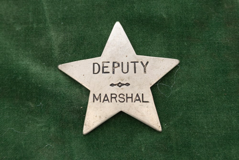 Small vintage 5-point Star Badge marked “DEPUTY MARSHAL??, pin is broken off with attempts to (1 of 2)