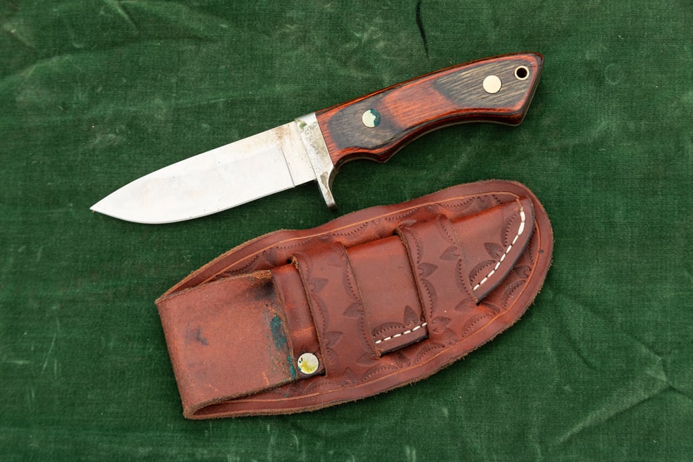 Heavy made Side Knife or Skinner in leather sheath marked "Dukes, Dude Buckaroos / Heinz Reichl, (1 of 2)