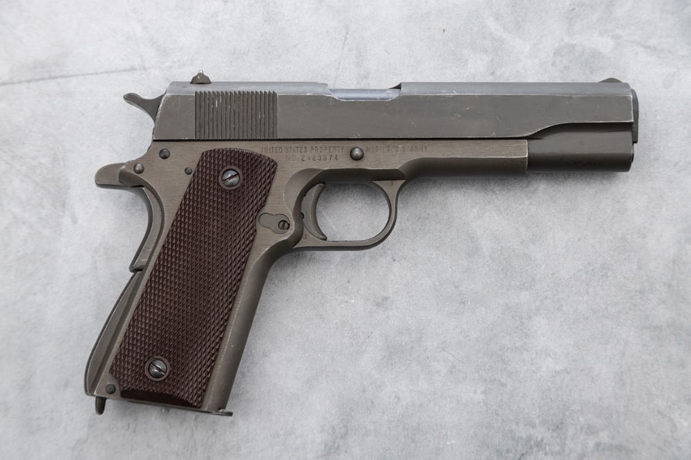 This Remington-Rand U.S. Army, .45 ACP caliber, Automatic Pistol, Model of 1911 A1, SN 2423874, 5" (1 of 4)