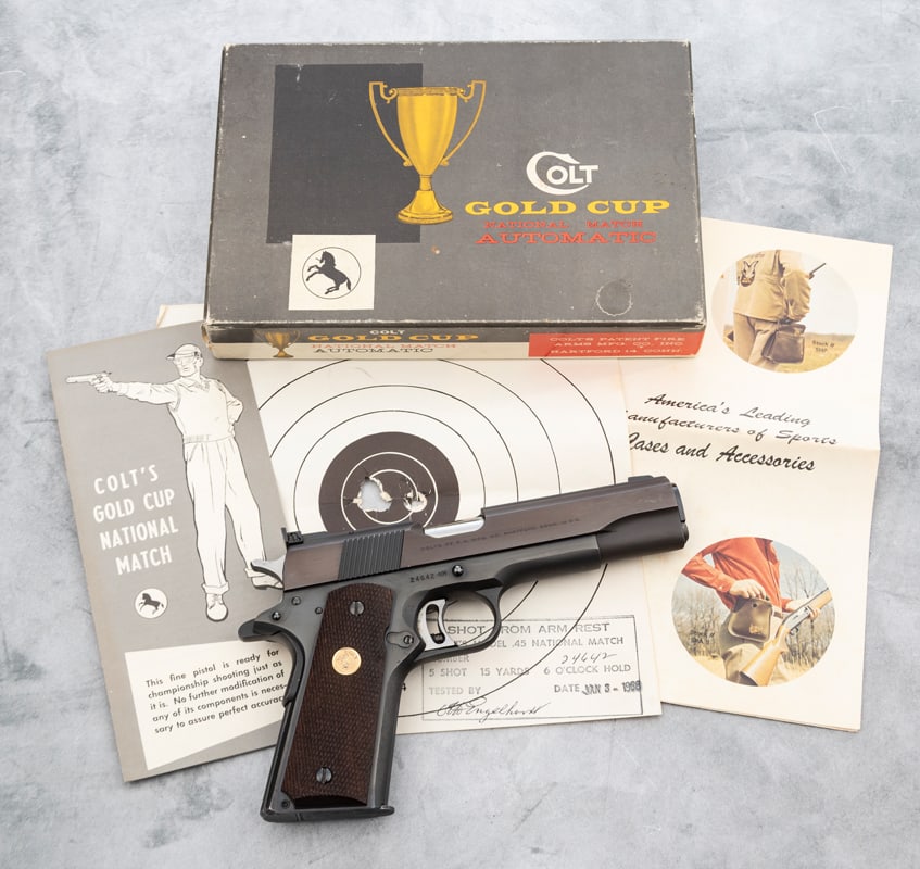Colt Series 70 Gold Cup National Match, Model 1911, Automatic Pistol, .45 ACP caliber, SN 24642NM,: Colt Series 70 Gold Cup National Match, Model 1911, Automatic Pistol, .45 ACP caliber, SN 24642NM, blue finish, 5" barrel, in "as new in the box" condition with the correct Colt Picture Box. All acces