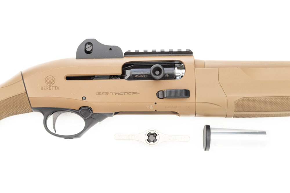 Beretta, 1301 Tactical, Semi-Auto Shotgun, 12 ga., SN MA030811, in as new condition, 20" barrel,: Beretta, 1301 Tactical, Semi-Auto Shotgun, 12 ga., SN MA030811, in as new condition, 20" barrel, maybe never fired. Sold with extension factory recoil pad, stainless choke and tool, paperwork and manu