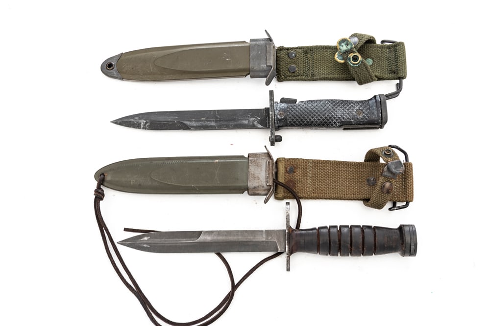 Two Bayonets to include: One is an M-5 A-1, complete with sheath in unused condition in its original (1 of 2)