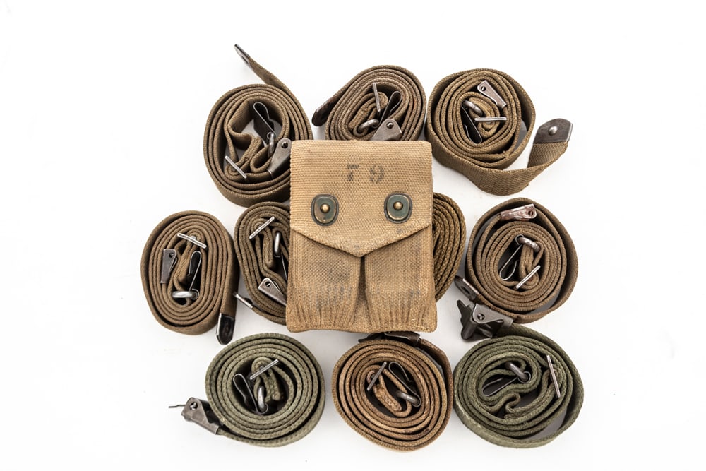 Ten (10) U.S. Military Canvas Rifle Slings and one Canvas Ammo Pouch. All show use but are in good (1 of 1)