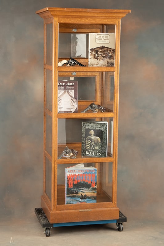 Beautiful antique oak Country Store, glass & wood Floor Model Showcase, in excellent finish and: Beautiful antique oak Country Store, glass & wood Floor Model Showcase, in excellent finish and condition. Brass label on front marked "Earl Bros. Case & Fixture Co.," Showcase has glass shelves and 4