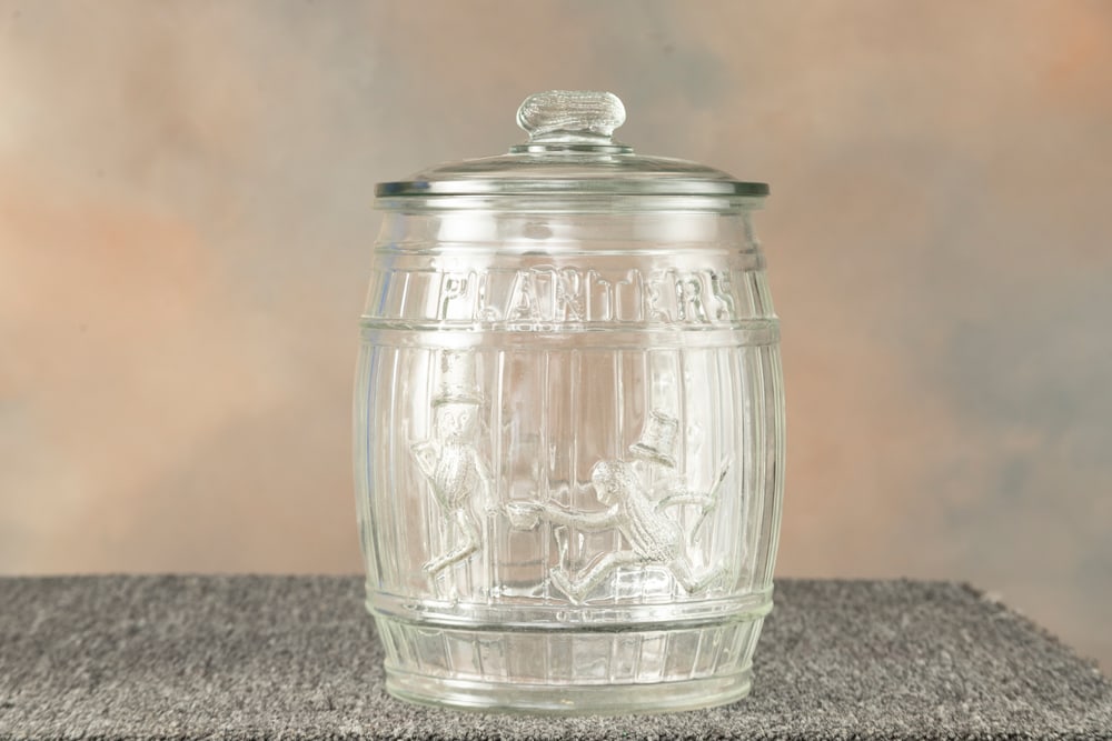 Antique glass Country Store Peanut Jar with embossed advertisement "Planter's", and embossed peanut (1 of 3)