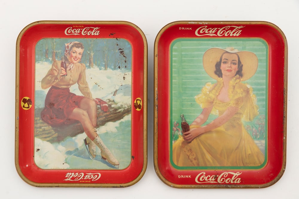 Two vintage Coca Cola Trays, one is dated 1941, the other is dated 1938, both are marked "American (1 of 2)