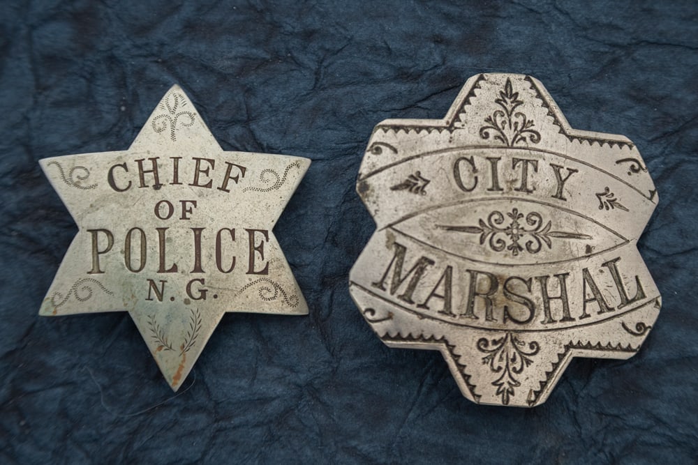 This lot consists of two Badges to include: (1) Vintage “CHIEF OF POLICE N.G.?? marked 6-point (1 of 2)