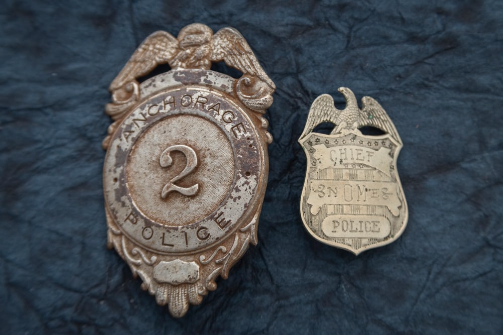 This lot consists of two Badges to include: (1) Vintage silver tone Shield Badge with Eagle Crest (1 of 2)