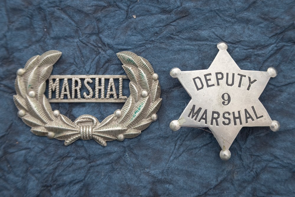 This lot consists of two Badges to include: (1) Small vintage 6-point Ball Star Badge marked (1 of 2)