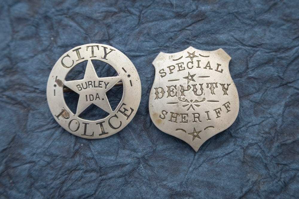This lot consists of two Badges to include: (1) Small vintage Circle Badge with cut-out 5-point Star (1 of 2)