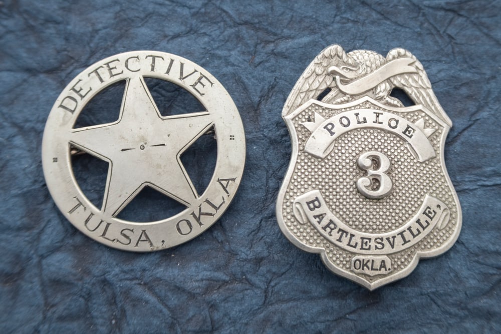 This lot consists of two Badges to include: (1) Silver tone vintage Shield Badge with Eagle Crest (1 of 2)
