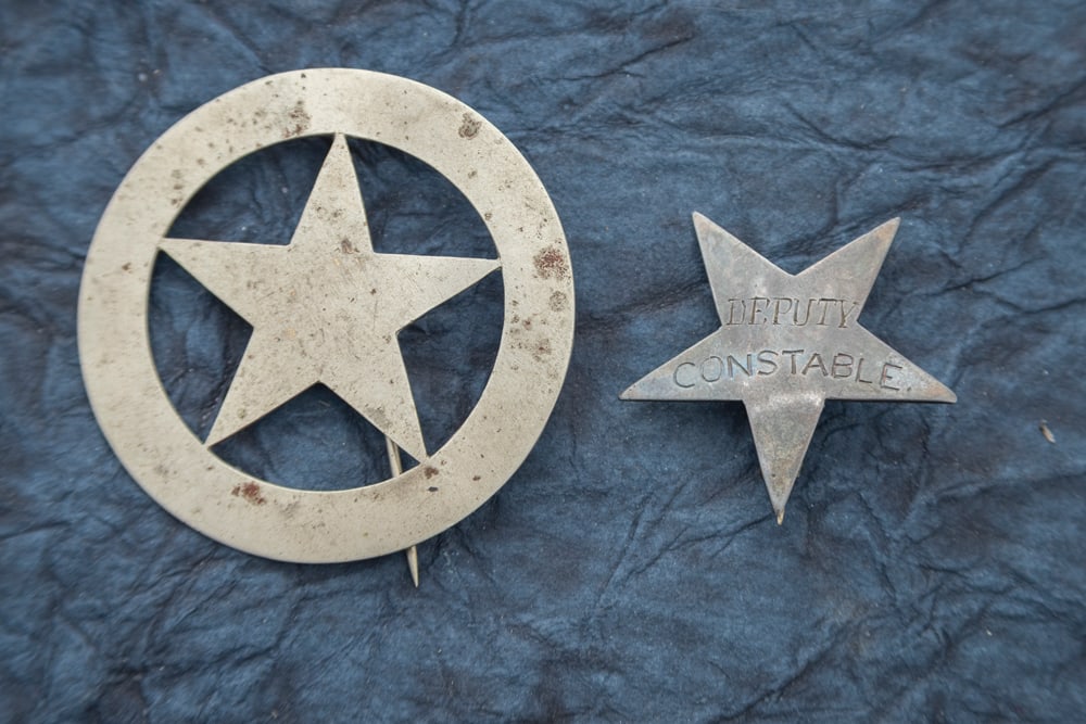 This lot consists of two Badges to include: (1) Large plain vintage Circle 5-point cut-out Star: This lot consists of two Badges to include: (1) Large plain vintage Circle 5-point cut-out Star Badge, no lettering or detailing on face of the Badge. Has surface spotting present, a “T” pin w